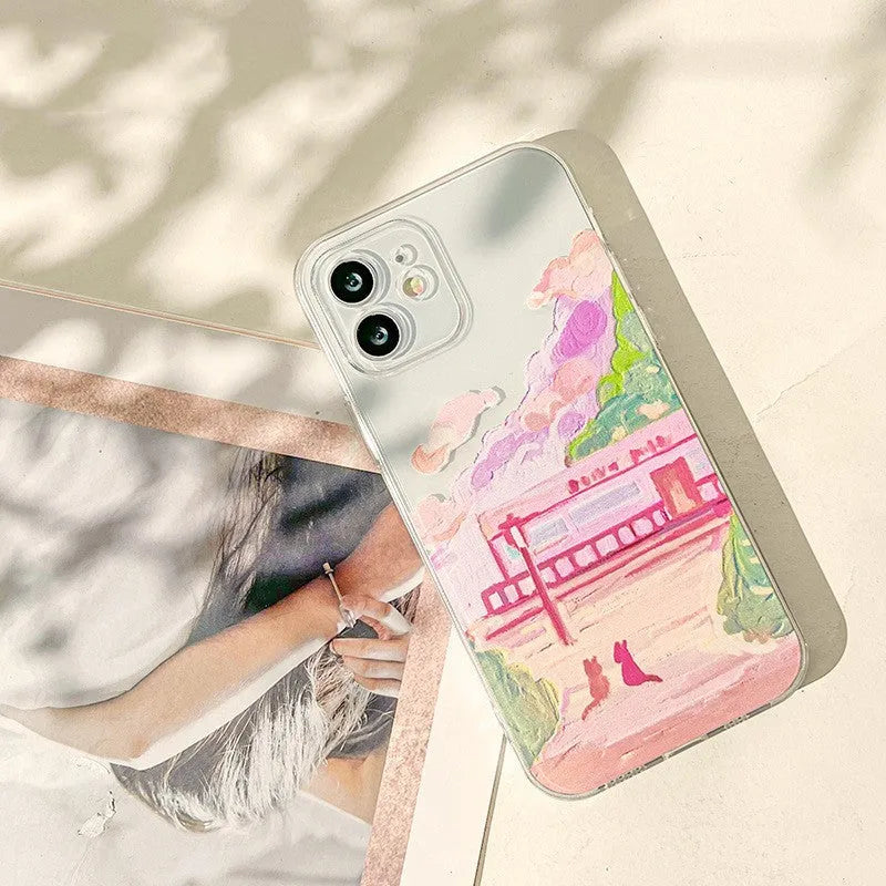iPhone mobile phone case with soft silicone construction and colourful two cat cartoon design on back