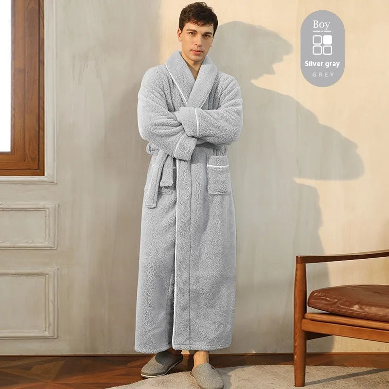 A man and woman wearing matching thickened flannel couple's bathrobes in a winter colour.