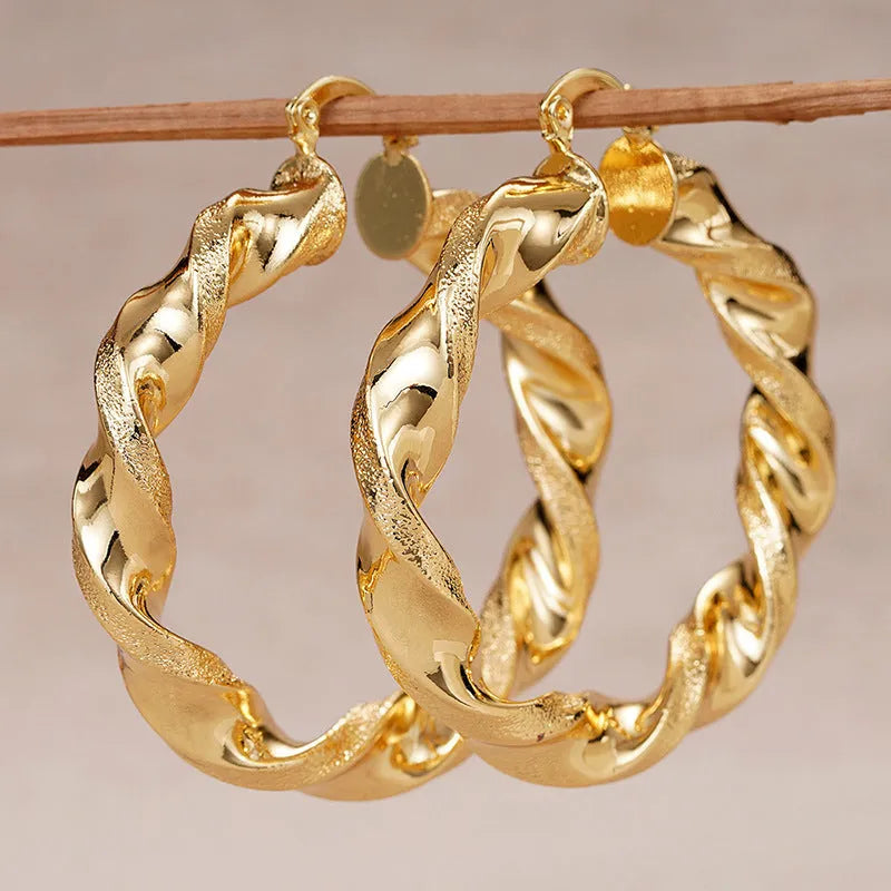 Copper geometric ring design ear clip earrings for women in assorted colours.