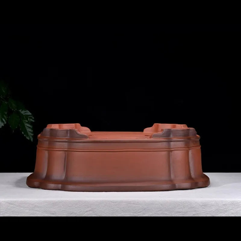 Large antique-style rectangular purple clay flower pot with Chinese design elements.