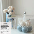 Finished round balloon bouquet decoration for cake table centrepiece.