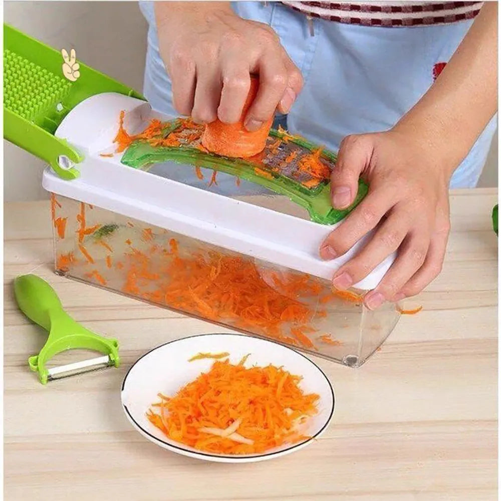 Green 12-piece manual vegetable chopper set with stainless steel blades on a kitchen counter.