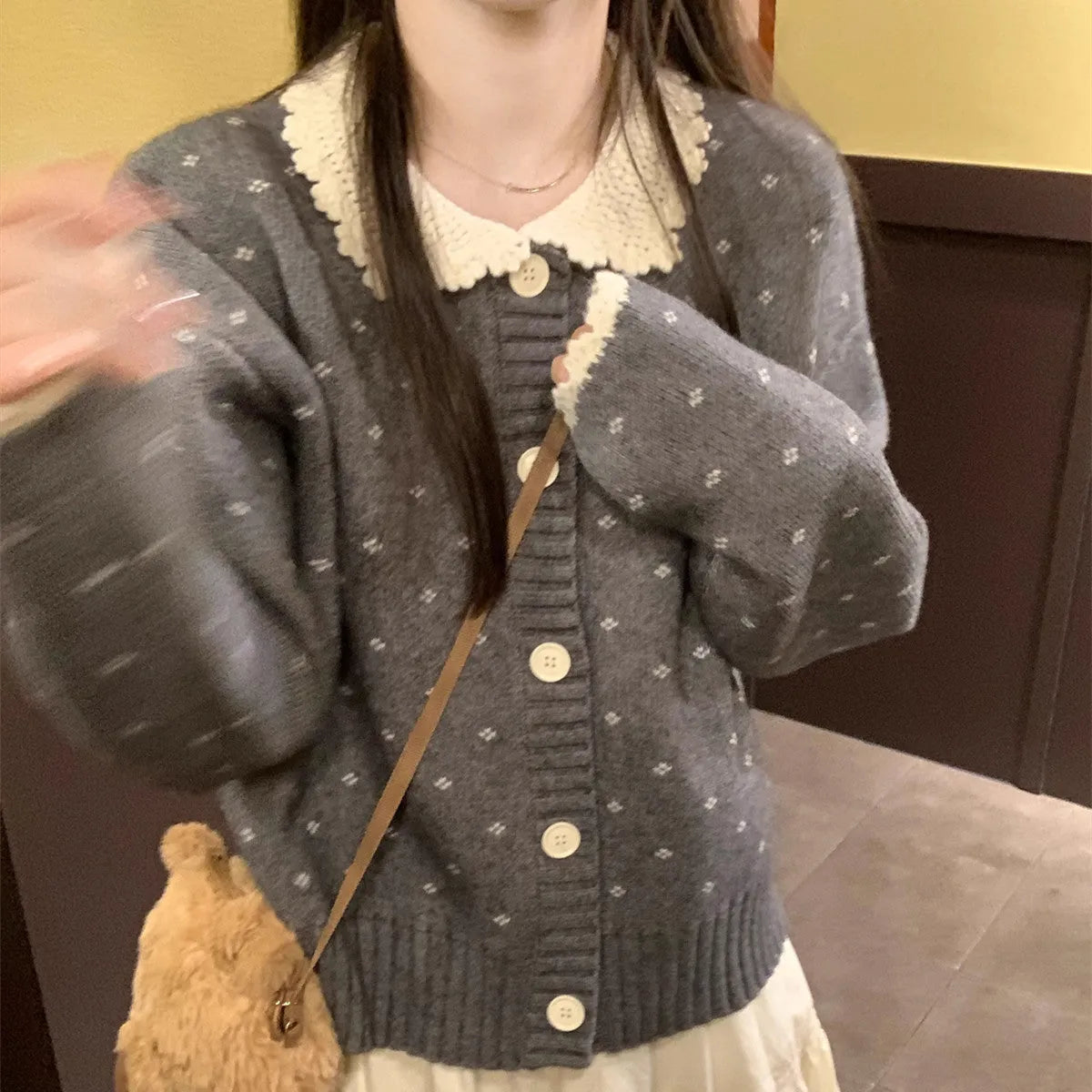 Floral pattern knitted cardigan coat with a Peter Pan collar in grey colour.