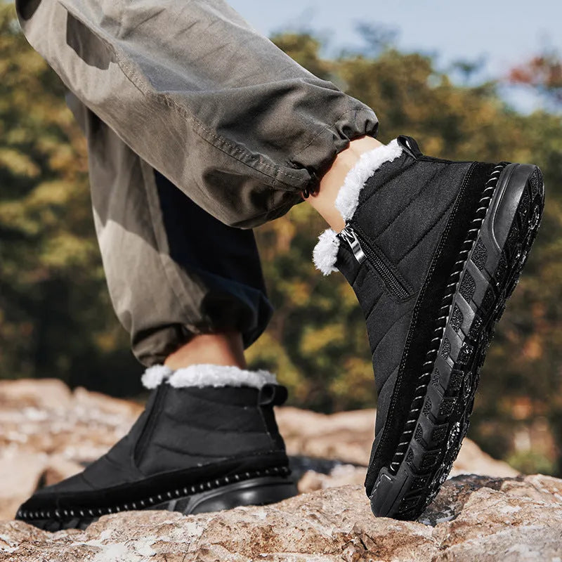 Men's plus size snow boot in black with round toe, flat heel, and non-slip rubber sole.