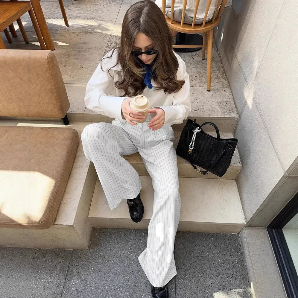 White striped wide-leg casual trousers with zipper detail shown in S/M/L sizes for commuting wear