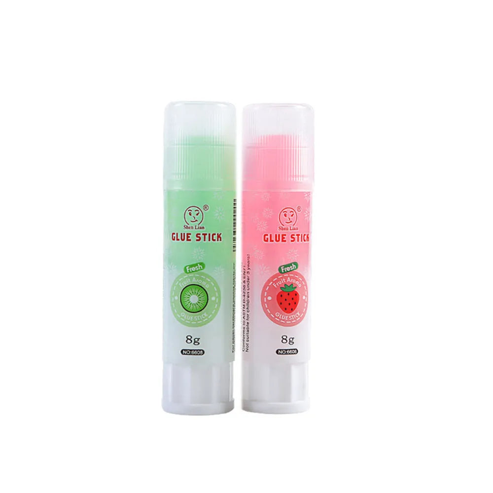Jelly fruit fragrance solid glue stick 8.5cm long with random colour barrel on white background