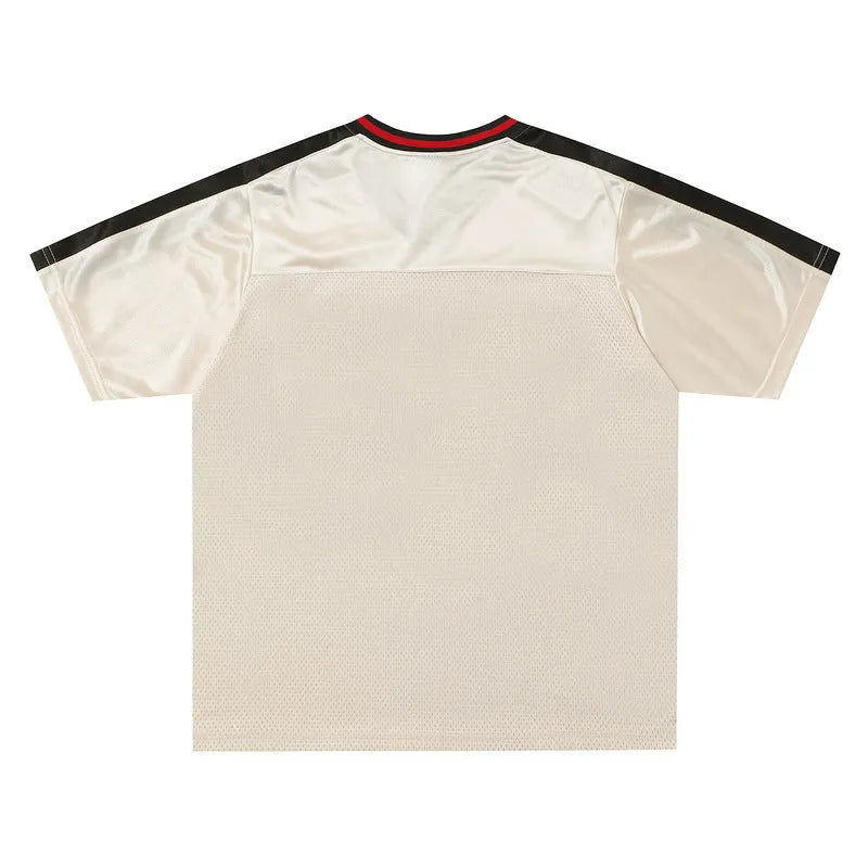 Apricot V-neck jersey top with letters pattern and drop shoulder sleeves