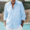 Man wearing a loose-fit 3D printed floral lapel shirt in a colourful pattern, short sleeves.