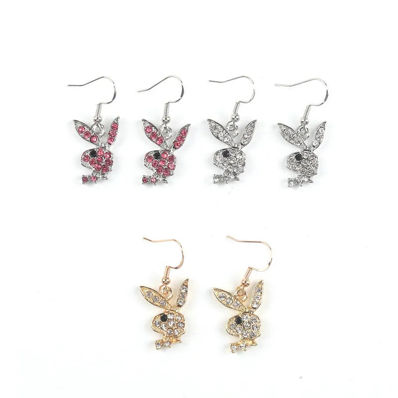 Full diamond rabbit stud earrings in silver, pink and gold colours with zodiac detailing