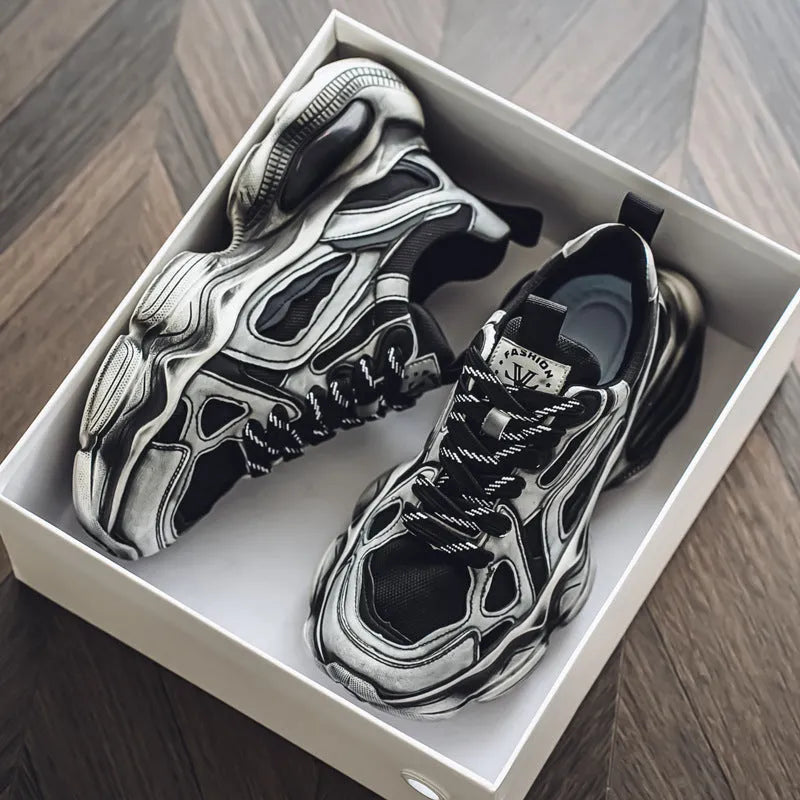 Men's black mesh sneakers with a cross strap and platform rubber sole.