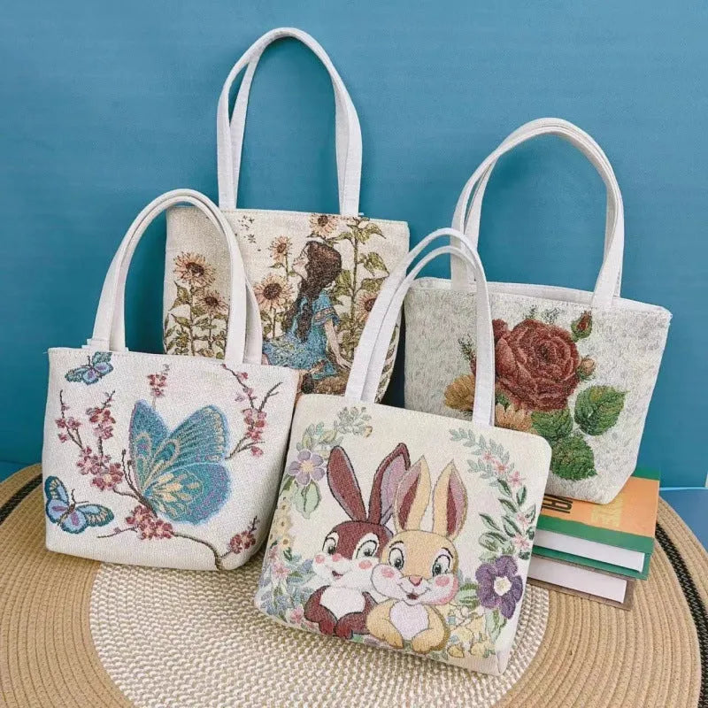 Double-sided gold wire embroidery canvas handheld bag showing decorative detailing