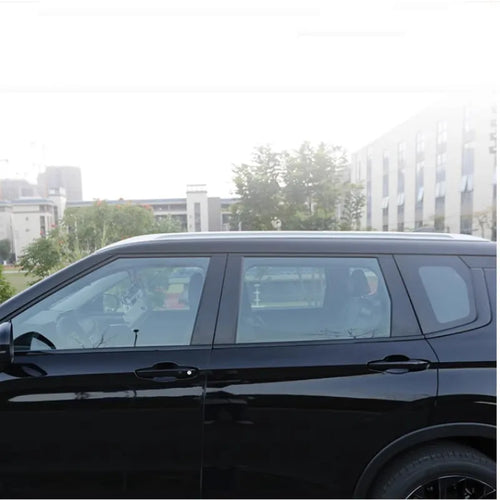 Pre-cut bright black and carbon fibre pattern vinyl films for 2023 Outlander window pillars.