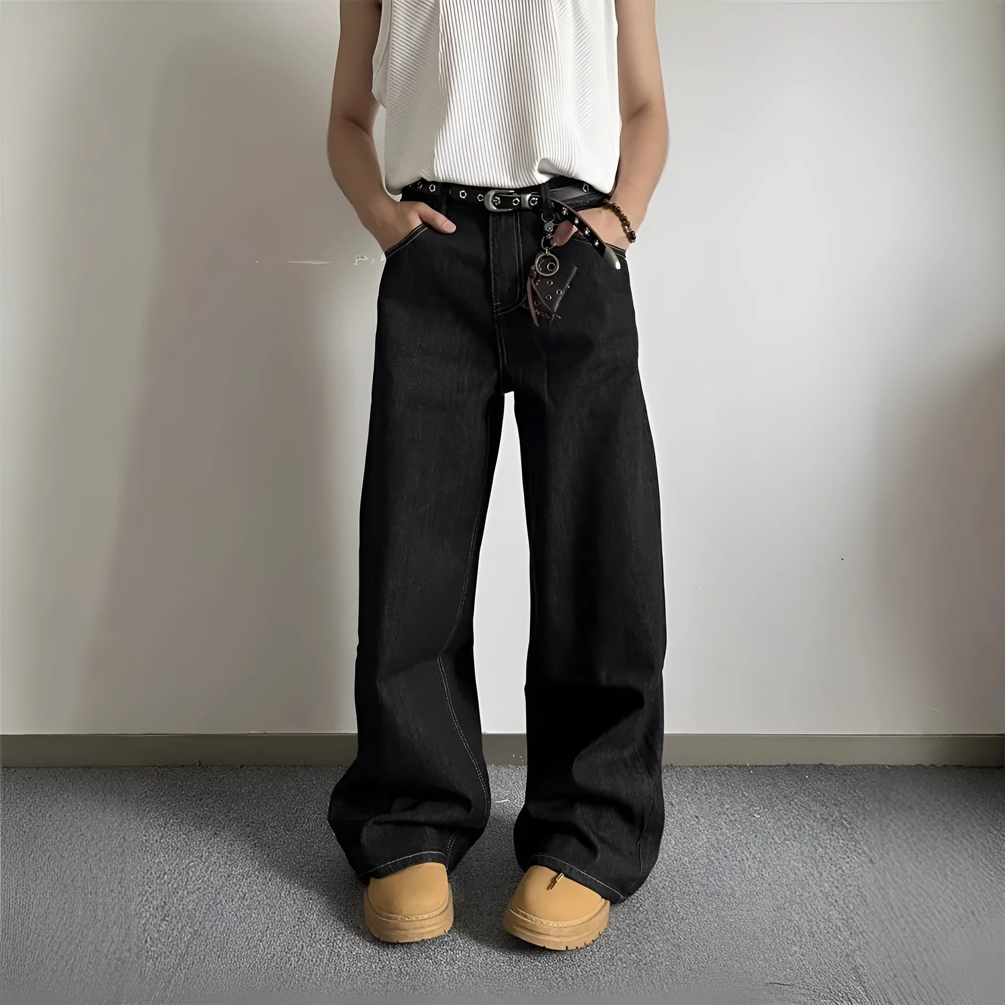 Black retro-style loose wide-leg straight-leg jeans on a hanger.