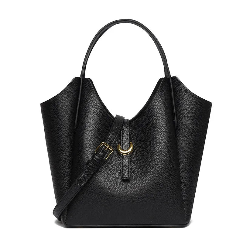 Genuine leather women's retro bucket handbag in beige with top handles and visible stitching.