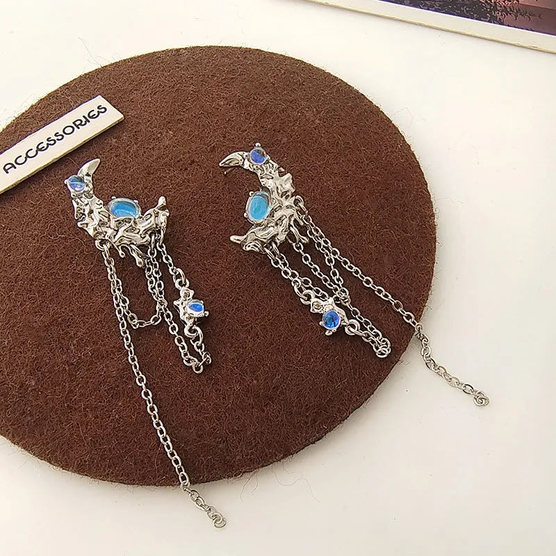 Pair of S925 silver needle moon earrings with long fringe and irregular polka dot detailing in silver tone