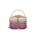 Women's retro style crossbody bag with pearl beads and rounded shape in soft PU material