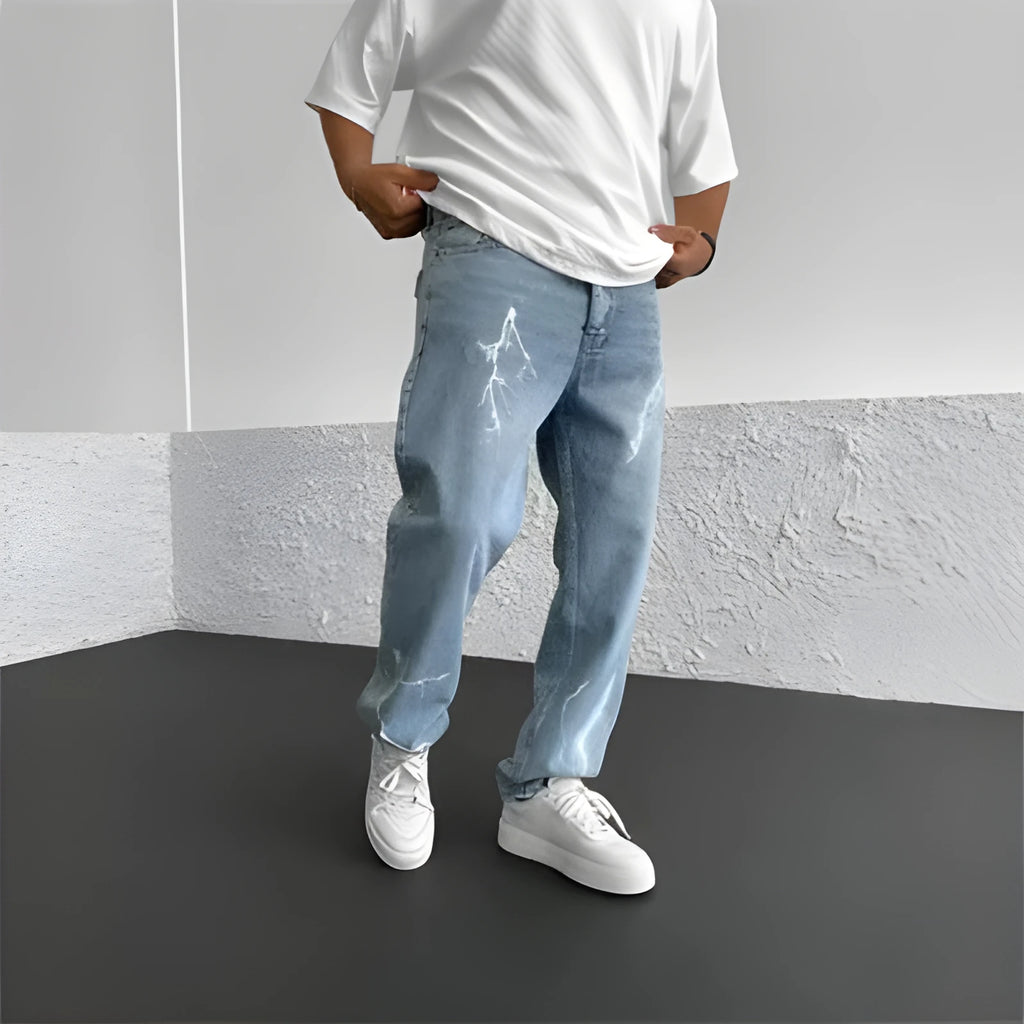 Men's blue straight-leg denim jeans with mid-waist design and loose wide-leg silhouette