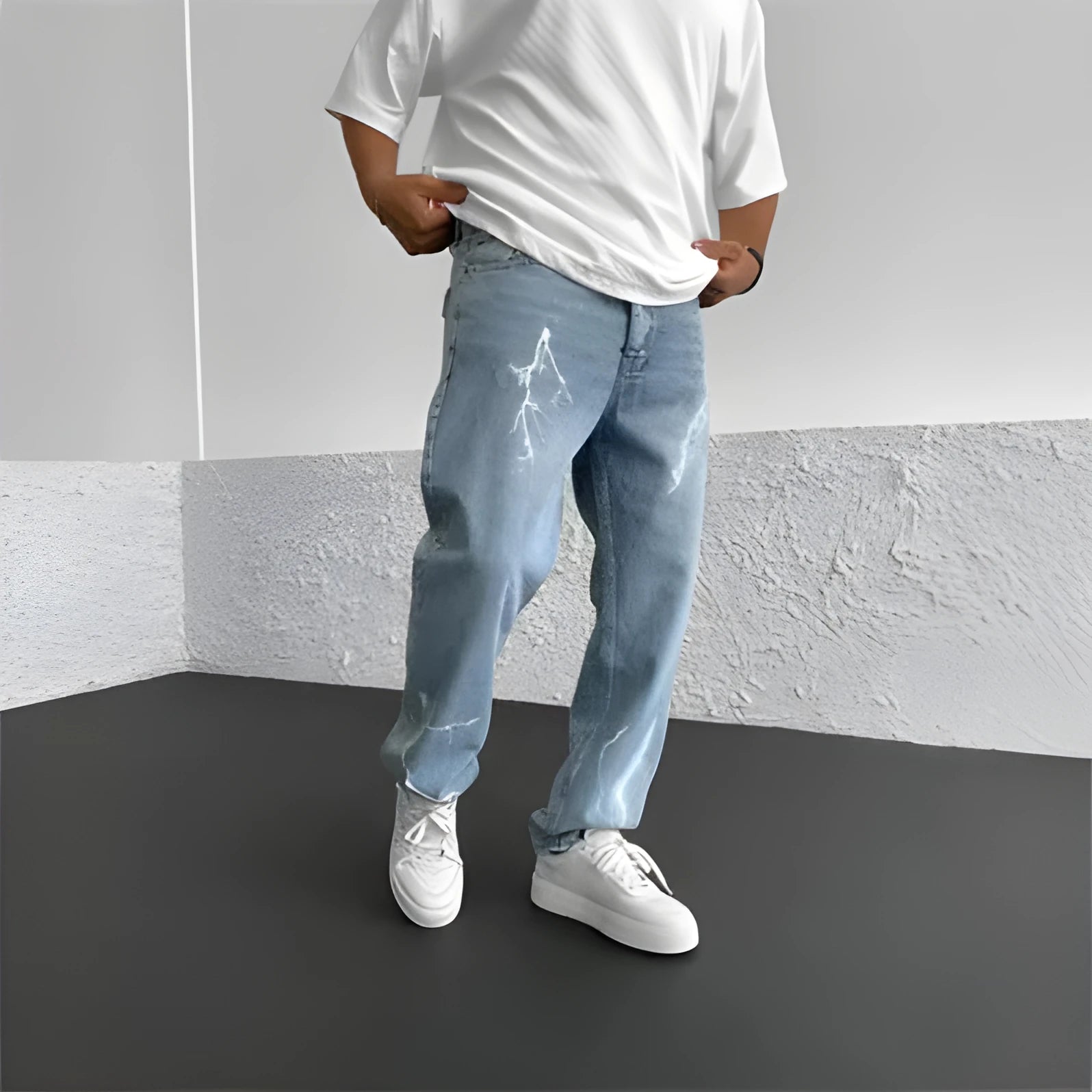 Men's blue straight-leg denim jeans with mid-waist design and loose wide-leg silhouette