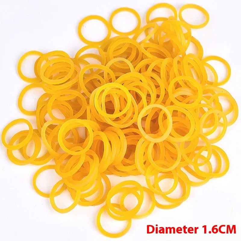 500g pack of assorted yellow rubber bands showing sizes from 16mm to 70mm diameter.