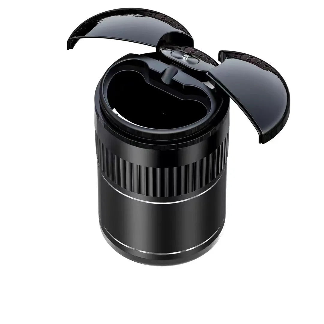 Black automatic infrared sensing metal car ashtray with lid on a car dashboard.