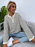 Black striped women's casual long sleeve top with drop shoulders and button details