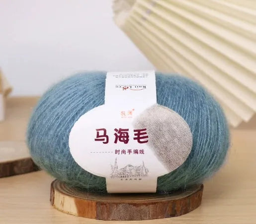 Mohair wool ball for DIY scarf knitting in assorted colours on white background