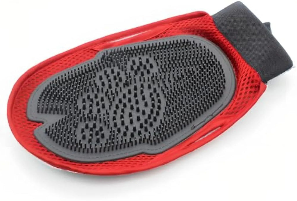 Red pet grooming glove combining a brush and mitt design for bathing dogs and cats.