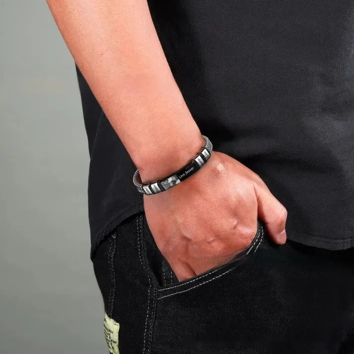 Men's stainless steel lettering bracelet with leather rope adjustable closure showing heart-shaped design