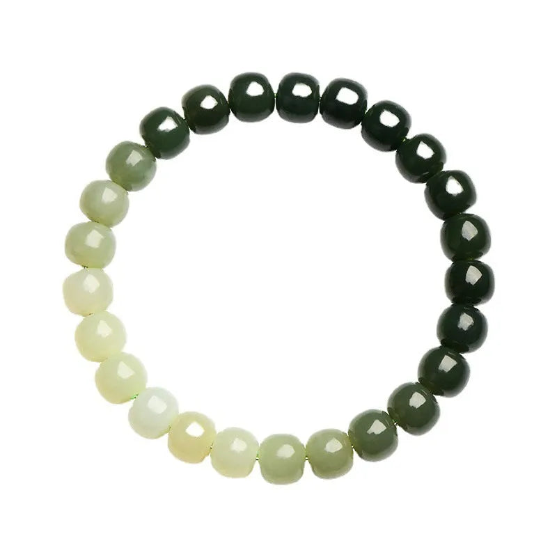 Natural Hetian jade bracelet showing water gradient colour on polished beads.