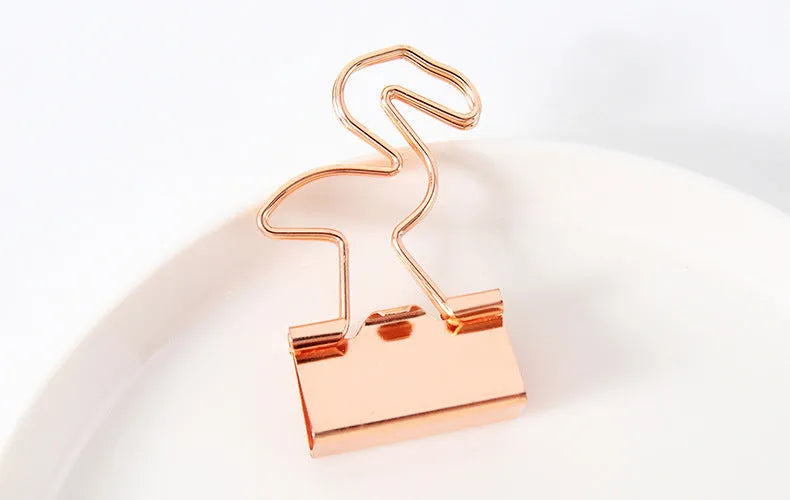 Gold-plated decorative binder clips showing flamingo, love, clouds, cat, cactus and bow designs