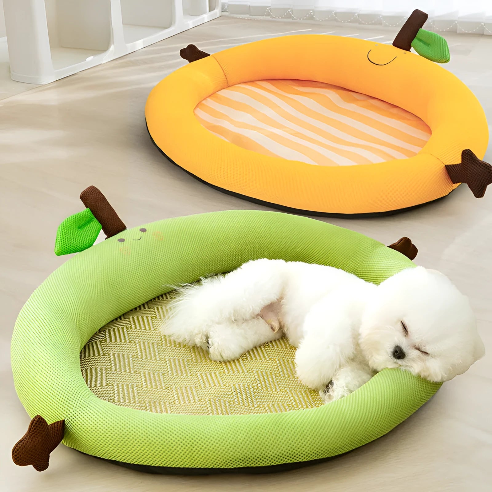 Green pet bed with fruit-patterned backrest, shown in large size for dogs.