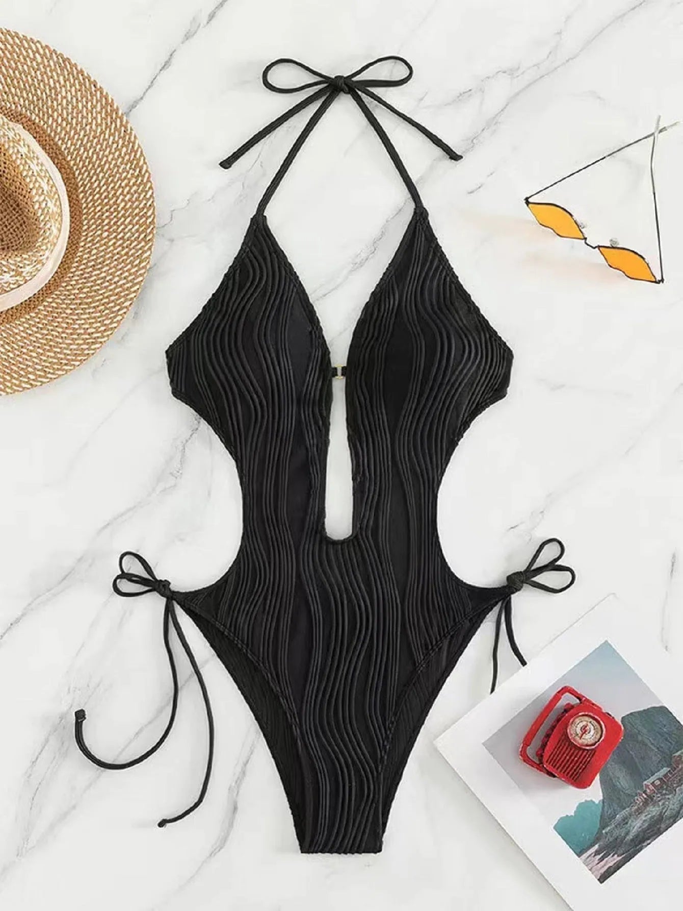 Women's black triangle bikini with front lace-up detail and matching bottoms