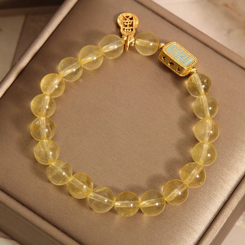 Women's yellow citrine crystal bracelet with rhinestones on adjustable 7-inch band