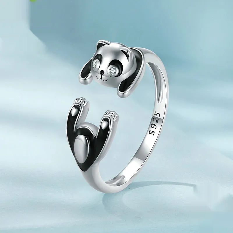 Adjustable sterling silver open ring with white gold plating and a detailed panda design.