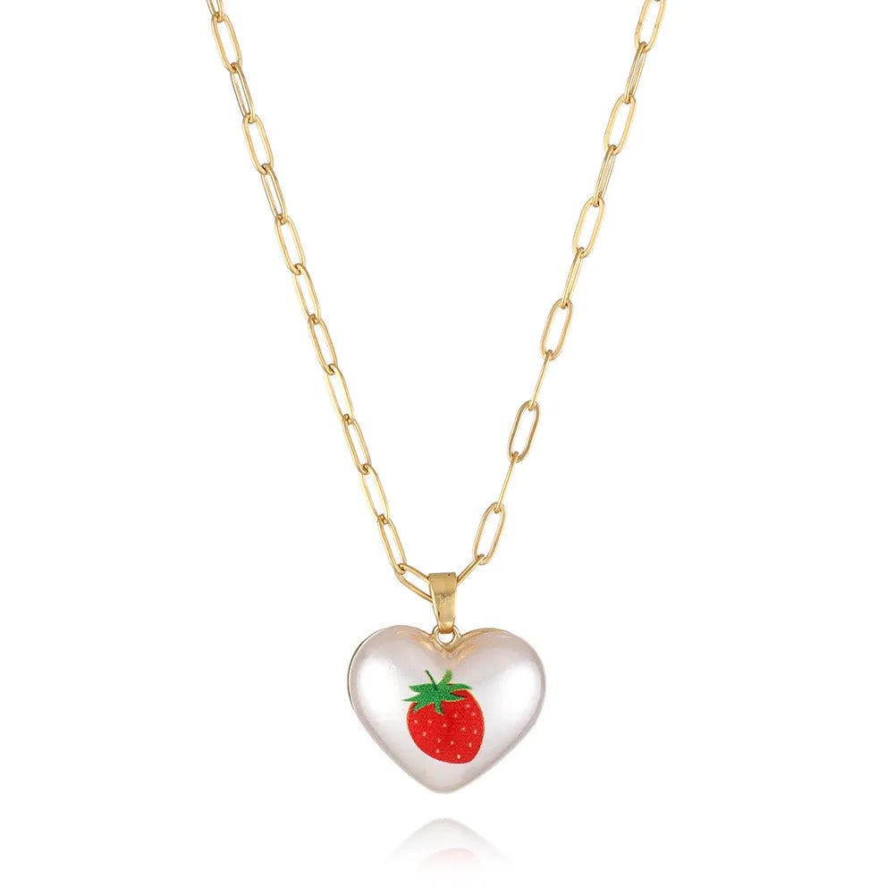 Geometric heart fruit pendant necklace with adjustable chain showing strawberry, pineapple, apple designs