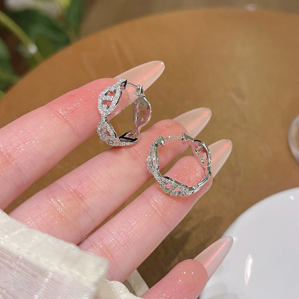 A pair of ladies casual earrings with electroplated copper construction and thick gold plating in silver, gold, or rose gold.
