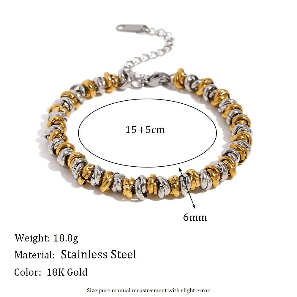 Gold electroplated jewellery set with geometric circle earrings, matching necklace and bracelet