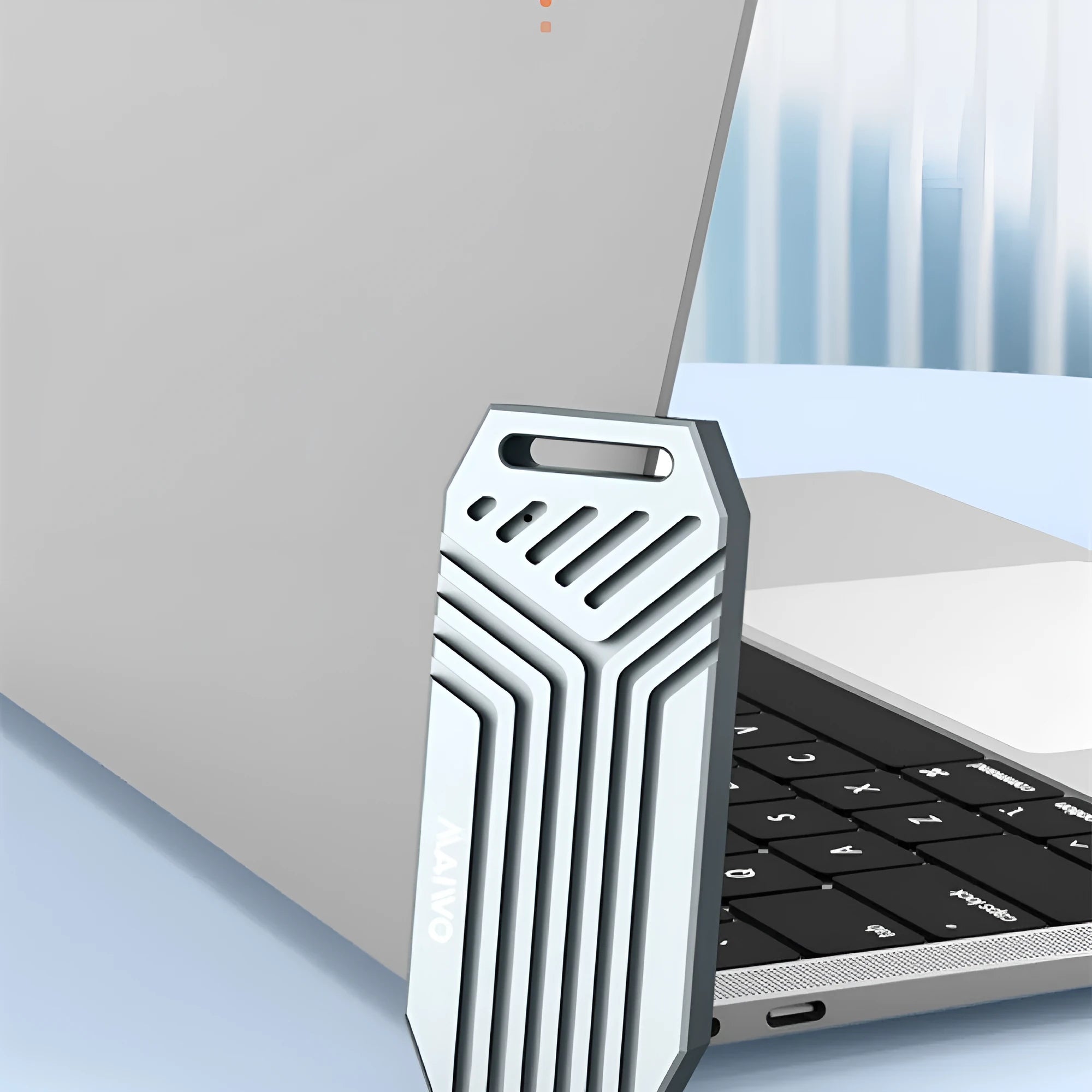 Aluminium Thunderbolt 4 external M.2 SSD enclosure in grey and silver finishes on a colour box.