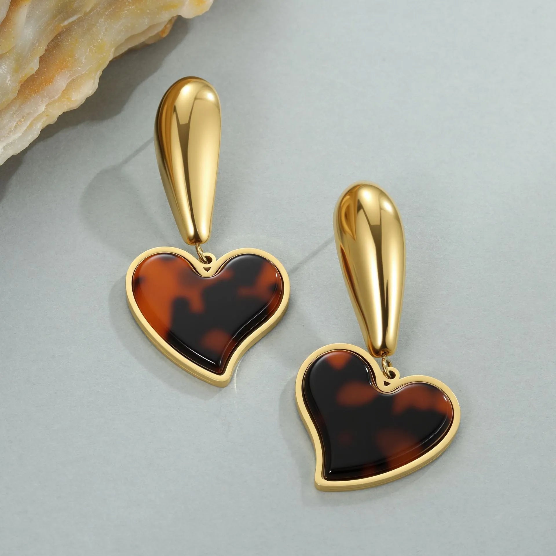 Women's tortoiseshell resin hawksbill colour earrings in heart and flower geometric designs on 18K electroplated stainless steel.