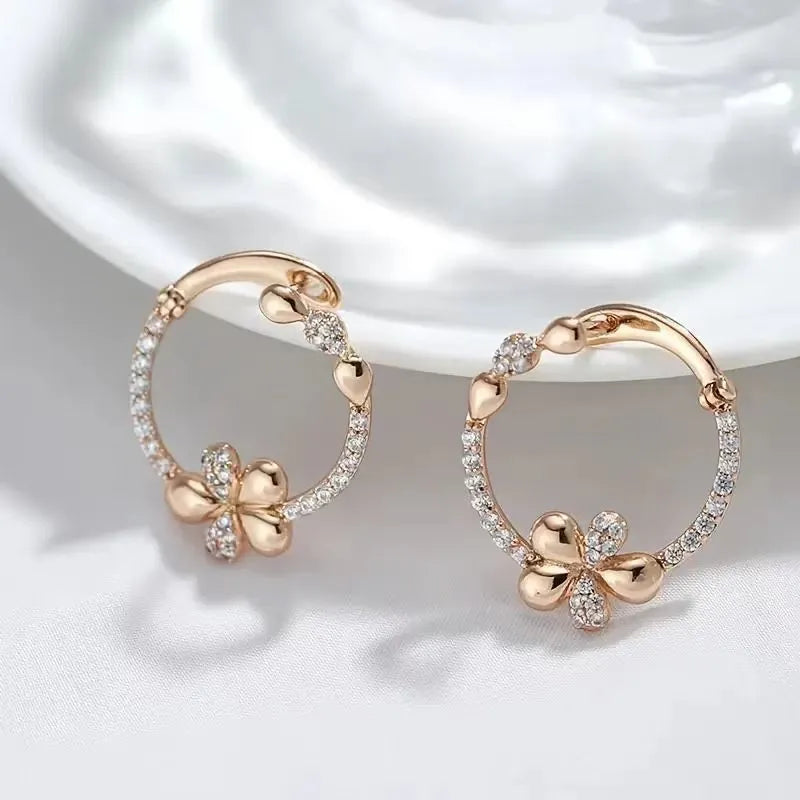 Women's round ring earrings in electroplated copper with geometric design