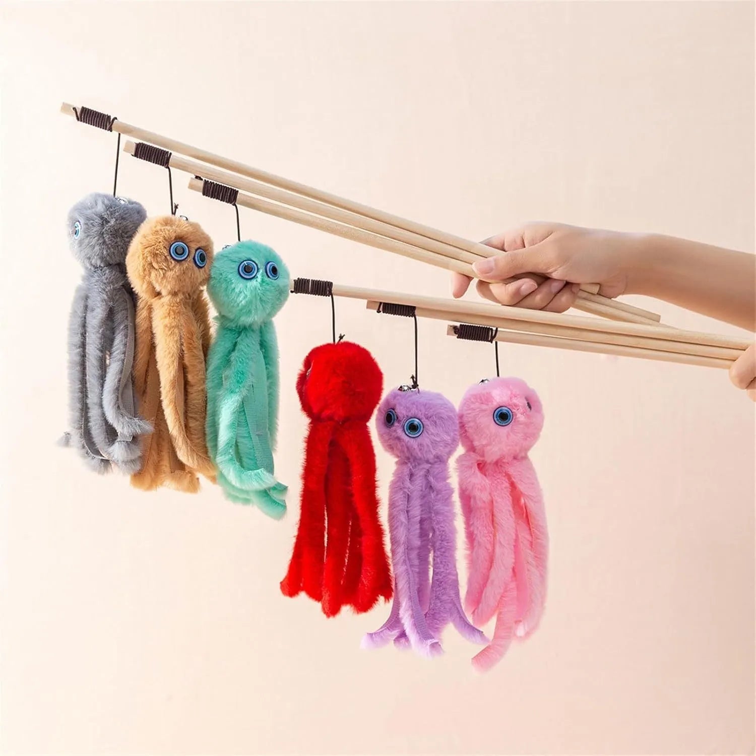 Octopus-themed cat toy on a long stick with bright colours, for interactive indoor play with kittens.