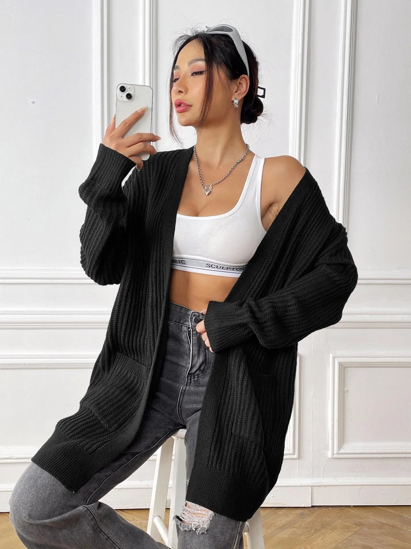 Women's mid-length loose fit cardigan with double pockets in dark green colour