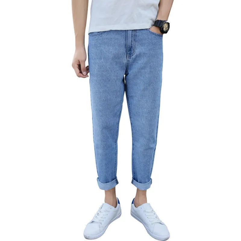 Men's straight-leg jeans in cotton with loose small harem cut in black or blue colour