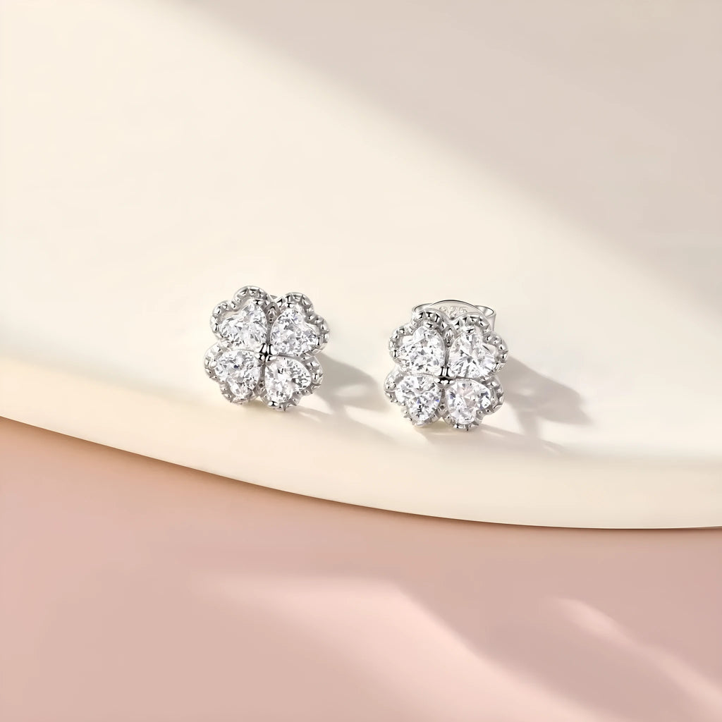 Silver zircon earrings with four-leaf clover and heart-shaped design in white gold colour