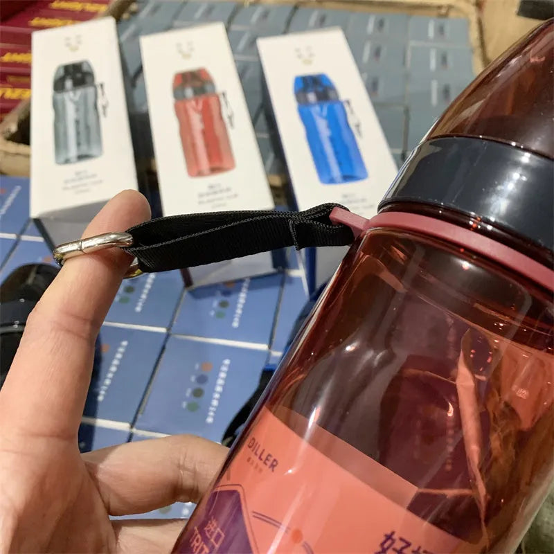 Stainless steel sports water bottle with removable tea compartment in blue colour option