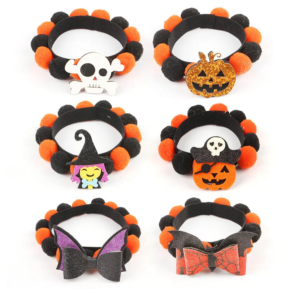 Halloween pet collar with soft fur ball pumpkin accessory in orange, sized on a dog's neck.