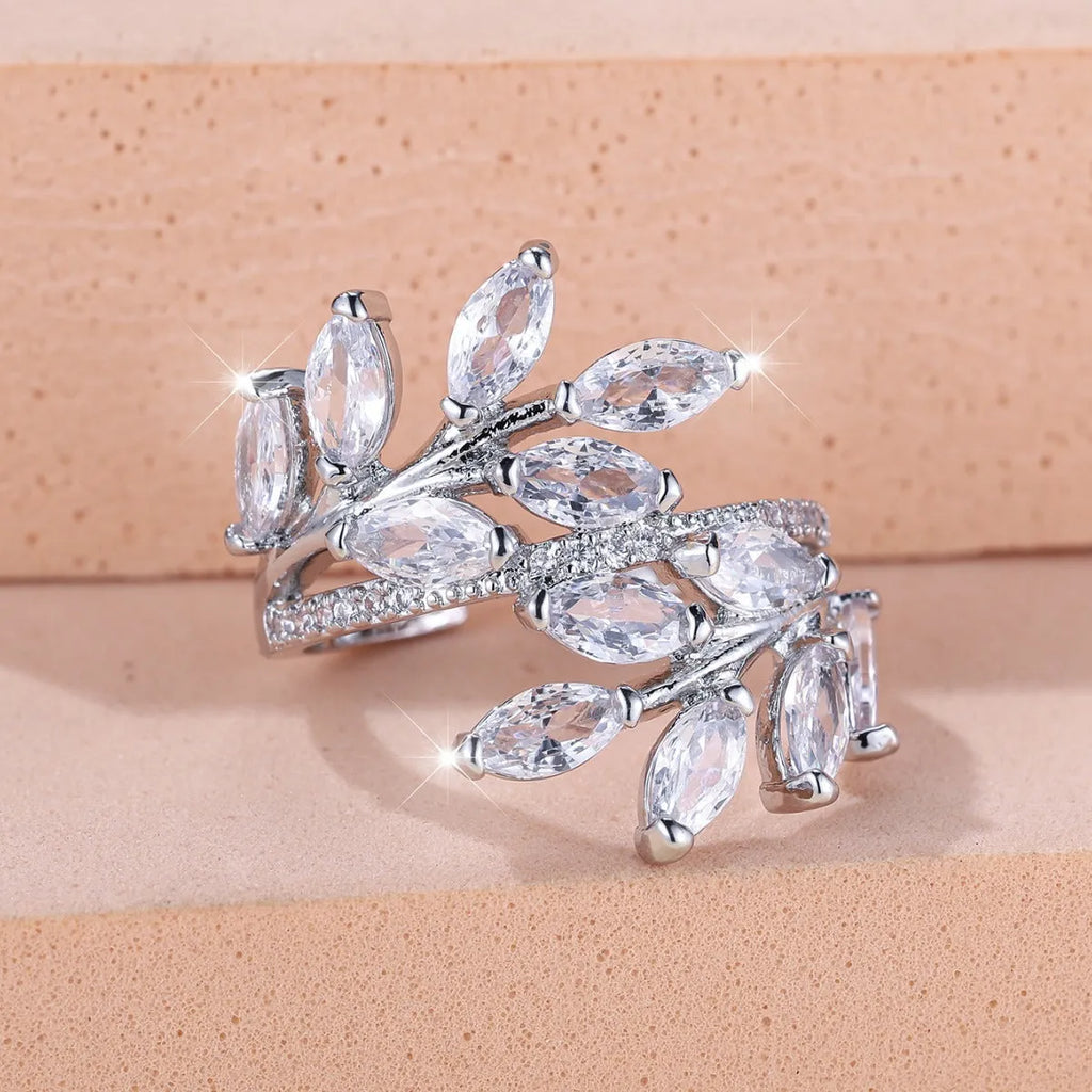 Adjustable copper ring with horse eye zircon stone and leaf design in multiple colour finishes