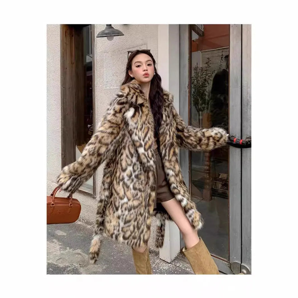 A woman wearing a long plush faux fur coat with a detachable fur collar and pockets, shown in a street fashion setting.