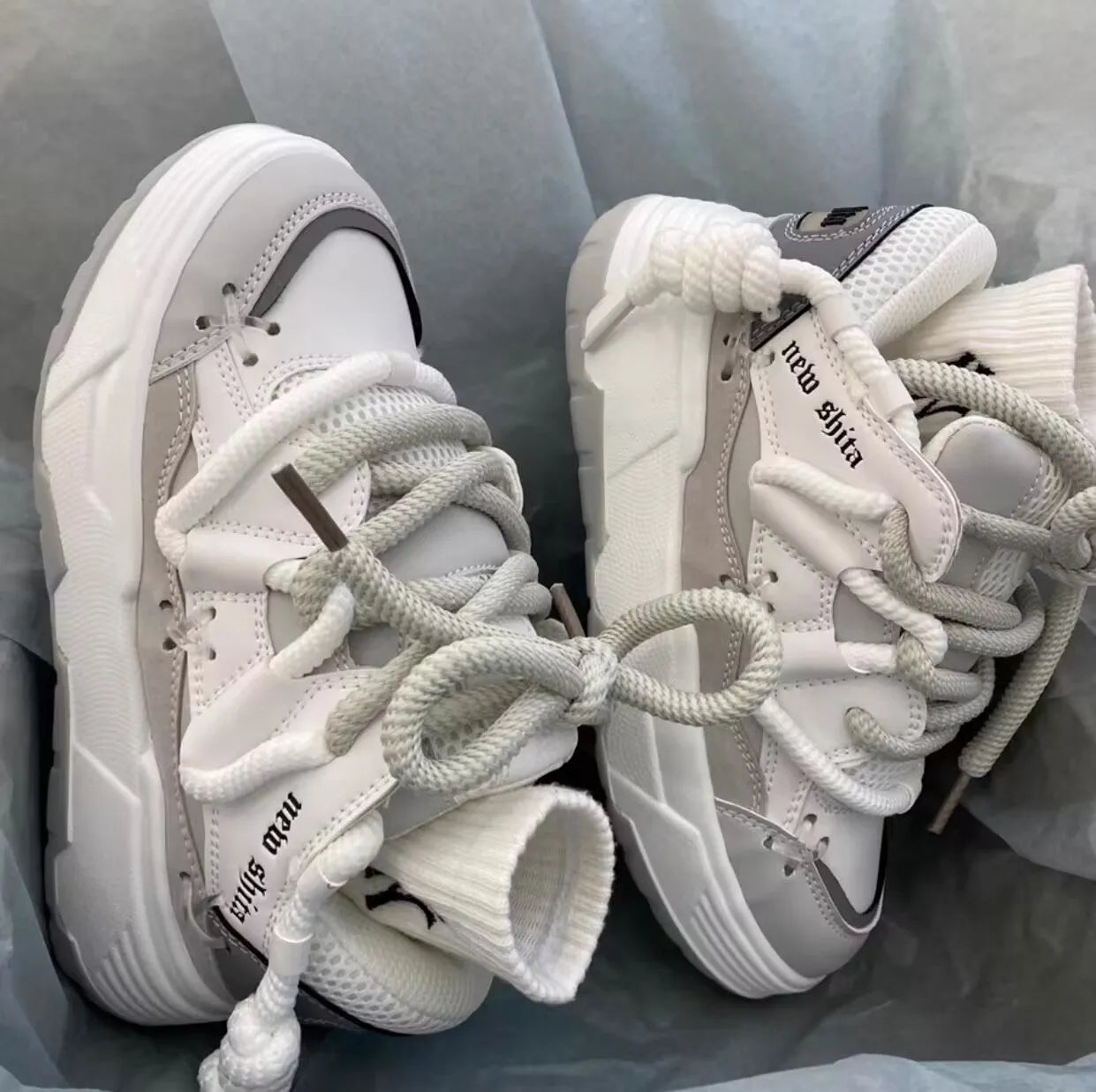 Women's chunky platform sneakers with 6-8cm heel in grey, showing round toe and front tie-up closure