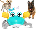 Blue interactive electronic crab dog toy crawling on floor with obstacle avoidance sensors and lights.